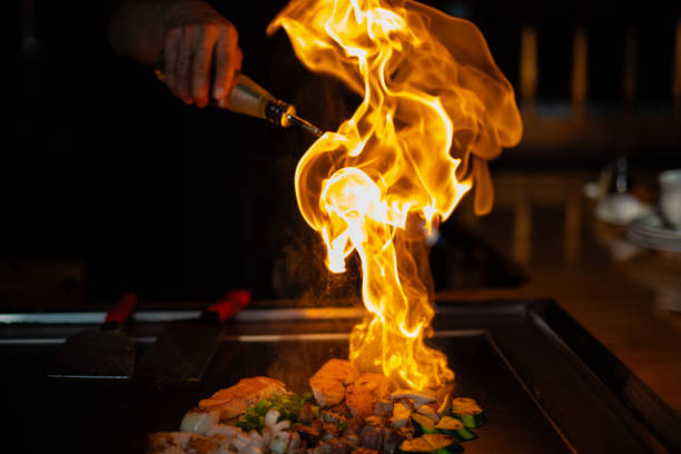 Flame on the teppan grill at Wabi Sabi